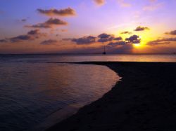 Sunset from the south beach of South Water Cay. by Martin Spragg 